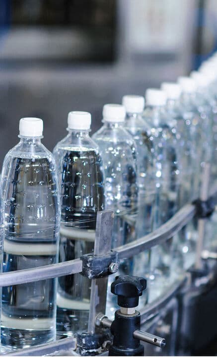 Business people discussing, talking and smiling during conference in modern office.
