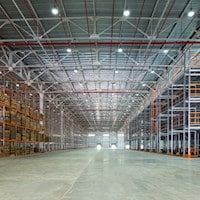 A warehouse that uses air filtration solutions to keep away harmful dust and contaminants