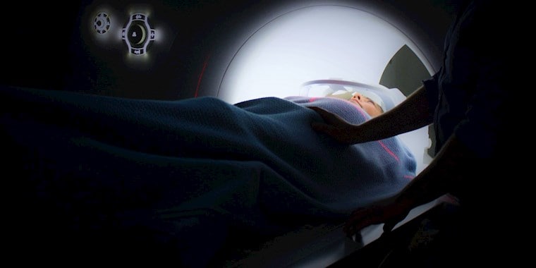 A patient in a scanner