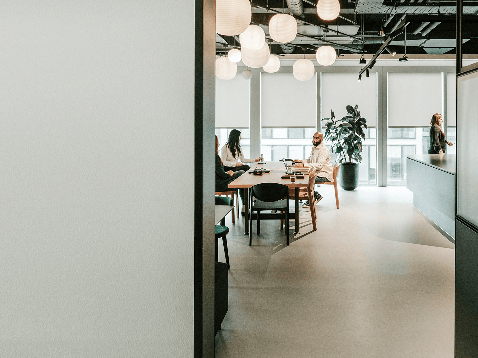 Office space area with 3 employees