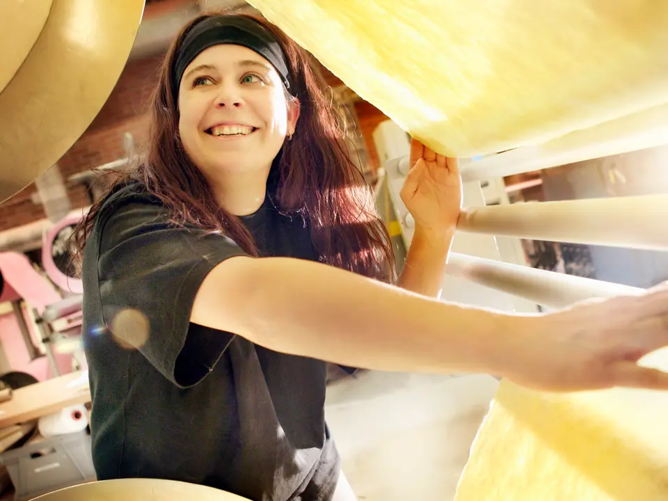 Woman in factory with filter media