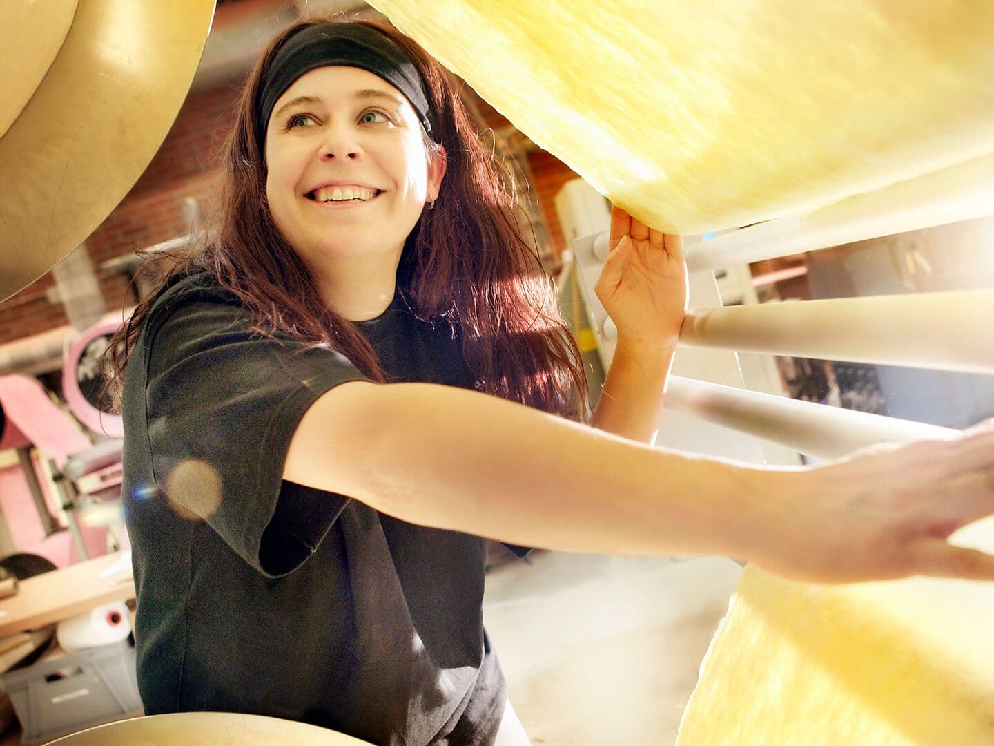 Woman in factory with filter media