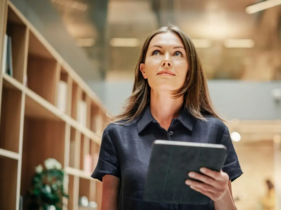 Woman holding a tablet