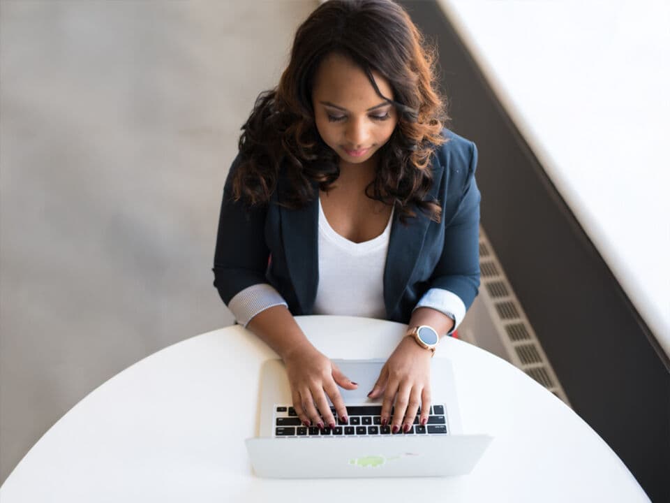 woman working on laptop computer