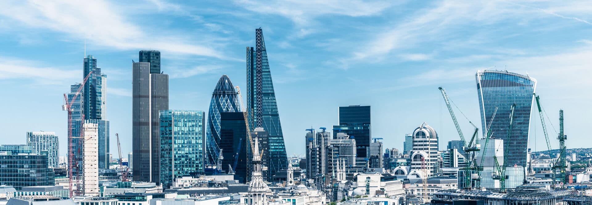 View of a city with buildings and blue skies